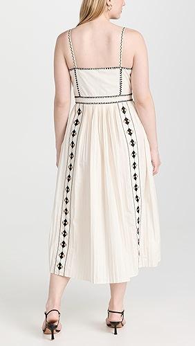 Camisole dress with black trim on white background