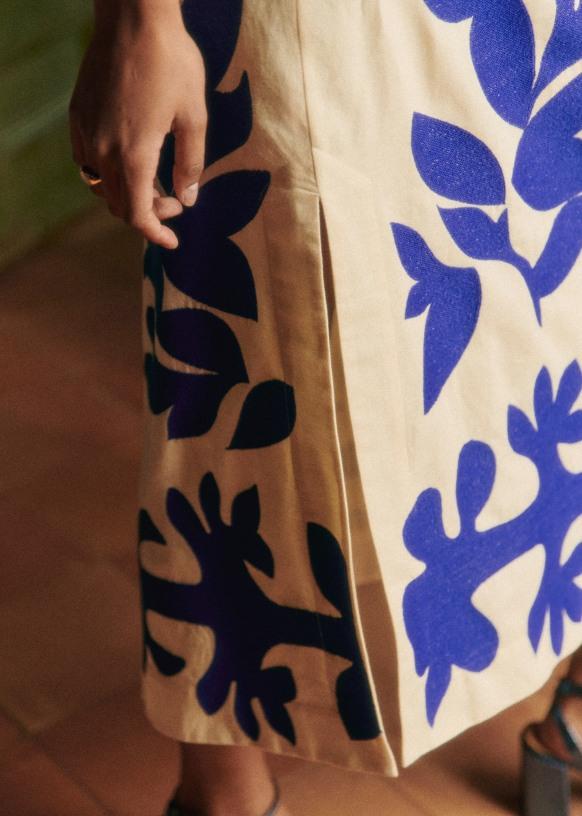 blue flower and white dress