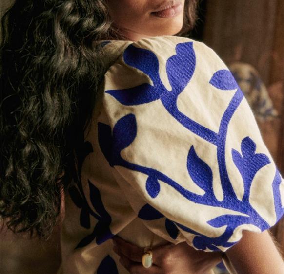 blue flower and white dress